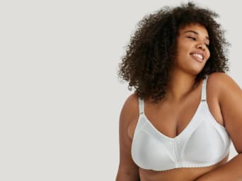 Types of bras for a larger bust: a minimiser bra. 