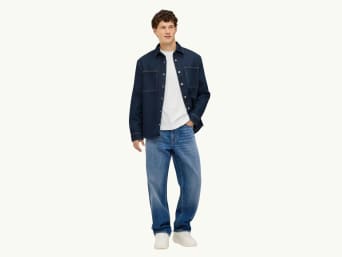 Wat is relaxed fit? Man in een relaxed jeans. Wat is relaxed fit? Man in een relaxed jeans.