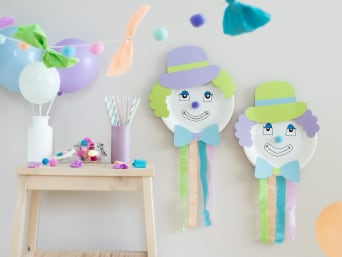Fasching basteln mit Kindern: verschiedene Ideen für bunte DIY-Faschingsdeko.