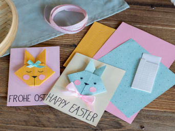 Auguri Buona Pasqua – Gli origami a forma di coniglietto sono una tenera decorazione per i tuoi biglietti.