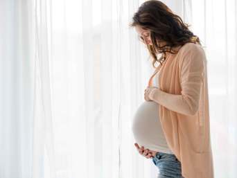 Modern maternity fashion: three pregnant women wearing different trendy outfits. Modern maternity fashion: three pregnant women wearing different trendy outfits.