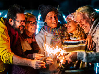 Planning a New Year’s Eve party: Family celebrates New Year’s Eve together.
