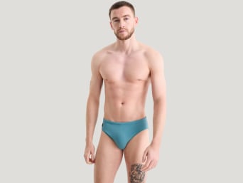 Swim briefs – a man wearing swim briefs. Swim briefs – a man wearing swim briefs.