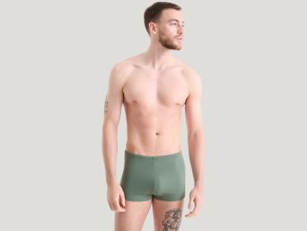 Swimming trunks – a man wearing swimming trunks. Swimming trunks – a man wearing swimming trunks.