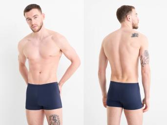 Badepants – Mann trägt eine sportliche Badepants. Badepants – Mann trägt eine sportliche Badepants.