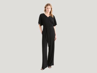 Dresscode cocktail donna: jumpsuit raffinata e moderna.