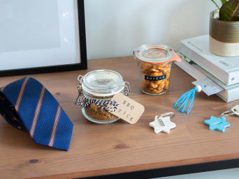 Father's Day craft ideas on a table.