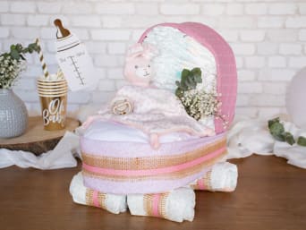 A pink nappy cake for girls.
