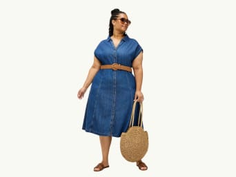 Flattering dresses for bigger busts: a woman in a dress with a button placket and a defined waist. Flattering dresses for bigger busts: a woman in a dress with a button placket and a defined waist.