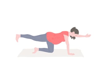 Pregnancy yoga - woman performing diagonal bipedal stand.