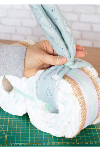 DIY nappy cake - handlebars made from flannel cloth.