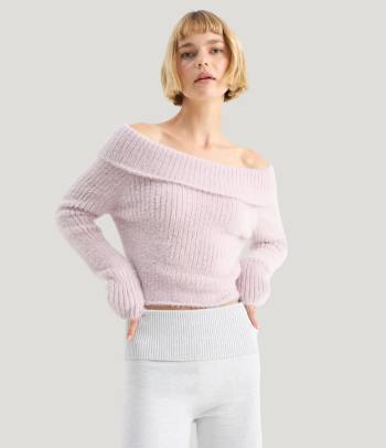 Bauchfreie Oberteile sind ein absolutes Must-have für ein gelungenes 2000er-Outfit.