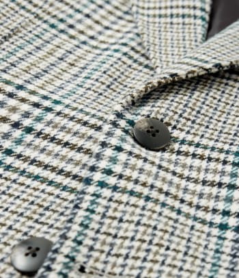 Anzugstoffe – Nahaufnahme eines Anzugs aus Tweed.
