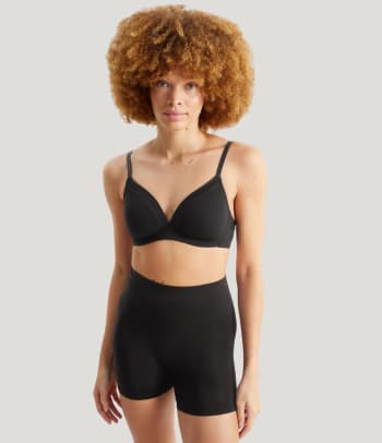 Waist shapewear: a woman wearing shapewear shorts.