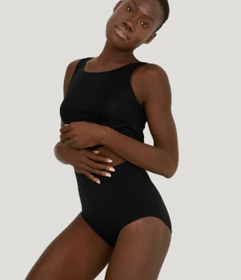 Tummy control shapewear: a woman wearing shaping briefs.