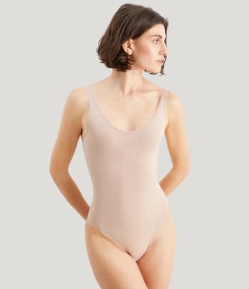 Tummy control shapewear: a woman wearing a shapewear bodysuit.