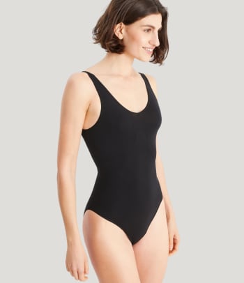 Shapewear for tummy, thighs and buttocks: a woman wearing a shapewear bodysuit.