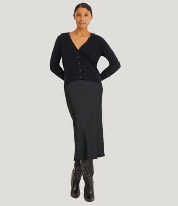 A cardigan outfit with a skirt for a smart occasion.
