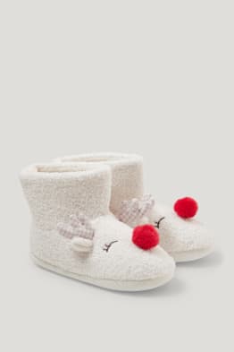 Chaussons en finition bouclé