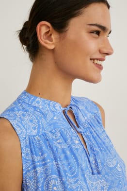 Blusa smanicata