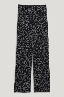 CLOCKHOUSE - pantalons de tela - high waist - wide leg - de flors