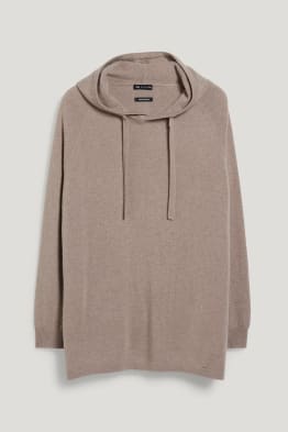Pull en cachemire à capuche.