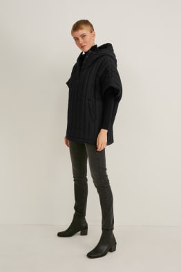 Poncho matelassé à capuche