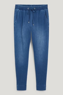 Džíny - mid waist - tapered fit