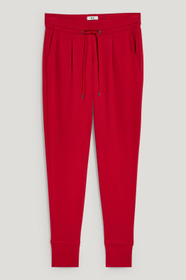 Žerzejové kalhoty - tapered fit