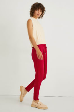 Žerzejové kalhoty - tapered fit