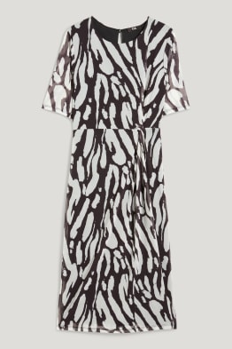 Robe moulante avec nœud - à motif