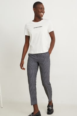 Pantalón - high waist - tapered fit - estampado