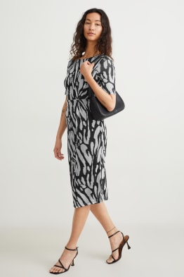 Robe moulante avec nœud - à motif