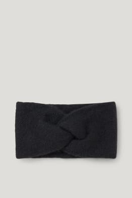 Fascetta scaldafronte in maglia con nodo