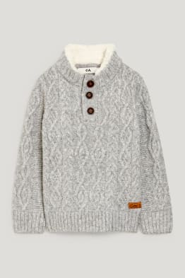 Sweter z wzorem warkocza