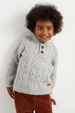 Sweter z wzorem warkocza