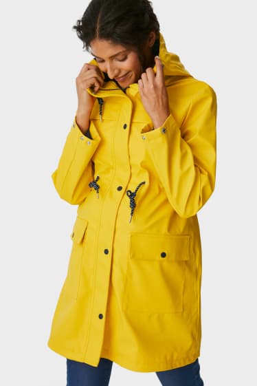 Femmes - Veste de pluie de grossesse à capuche avec empiècement porte-bébé - doublée - jaune