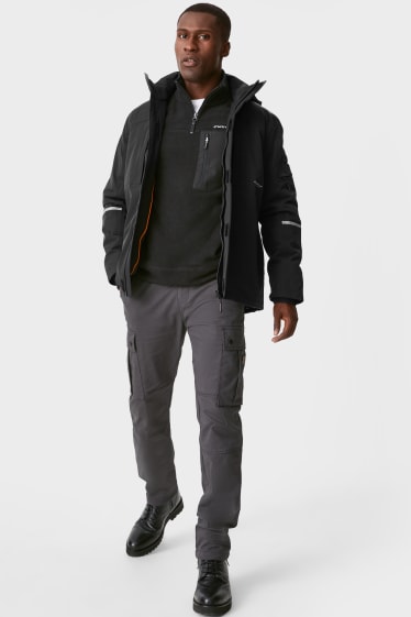 Herren - Softshelljacke mit Kapuze - THERMOLITE® - schwarz