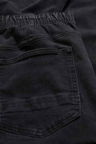 Mężczyźni - Tapered Jeans - bojówki dżinsowe - czarny