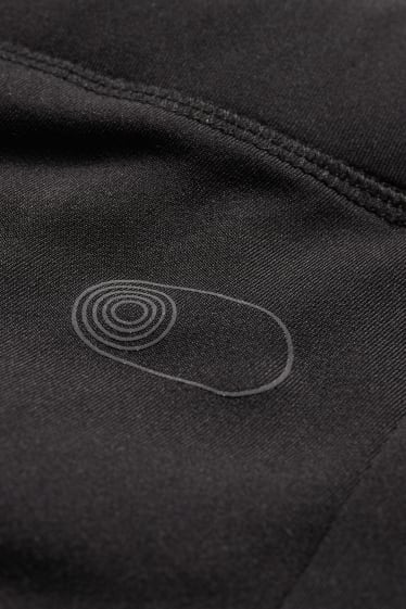 Pánské - Sportovní elastické kalhoty - černá