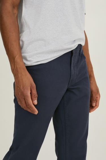 Mężczyźni - Spodnie - slim fit - ciemnoniebieski