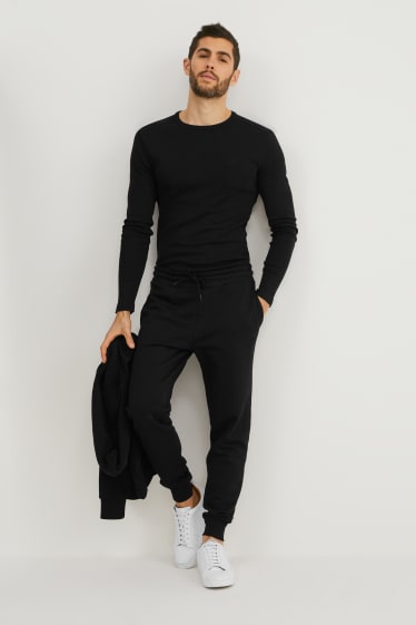 Hommes - Pantalon de jogging - noir