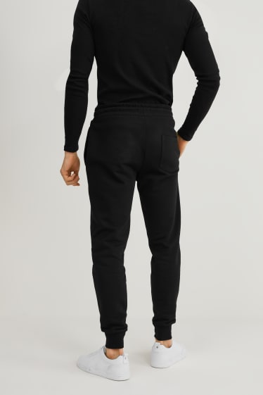Hommes - Pantalon de jogging - noir