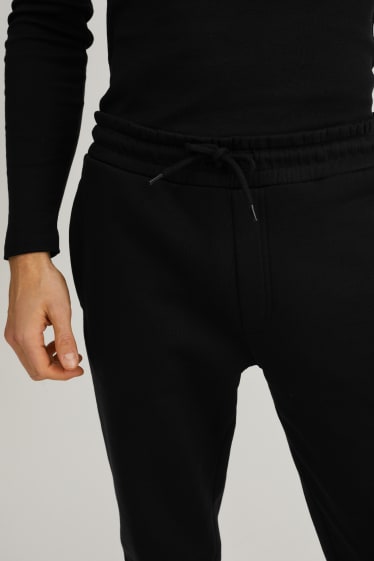 Hommes - Pantalon de jogging - noir