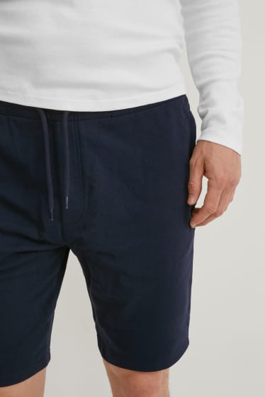 Uomo - Shorts in felpa - cotone biologico - blu scuro
