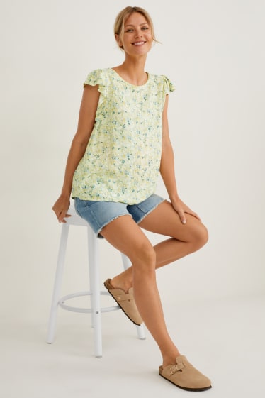 Dames - Zwangerschapsblouse - gebloemd - lichtgeel