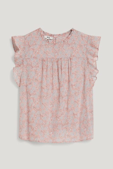 Dona - Brusa - de flors - rosa fosc
