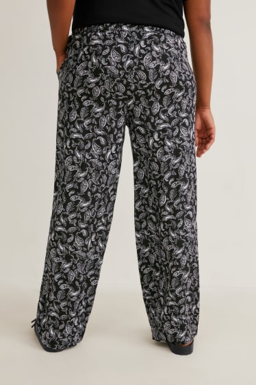 Femmes - Pantalon en toile - mid waist - jambe évasée - noir