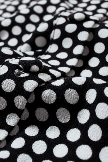Femmes - Combinaison - à pois - noir / blanc