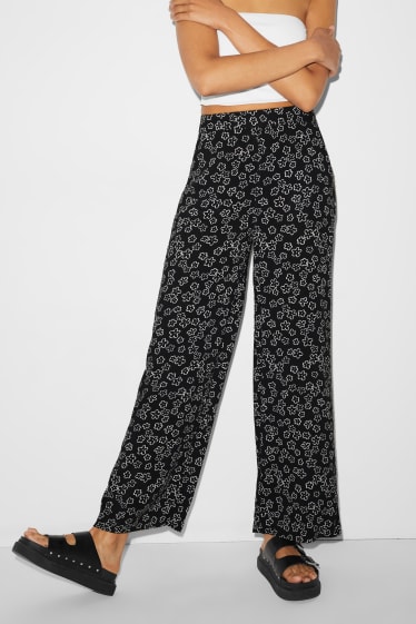 Clockhouse Girls - CLOCKHOUSE - pantalon - high waist - wide leg - gebloemd - zwart